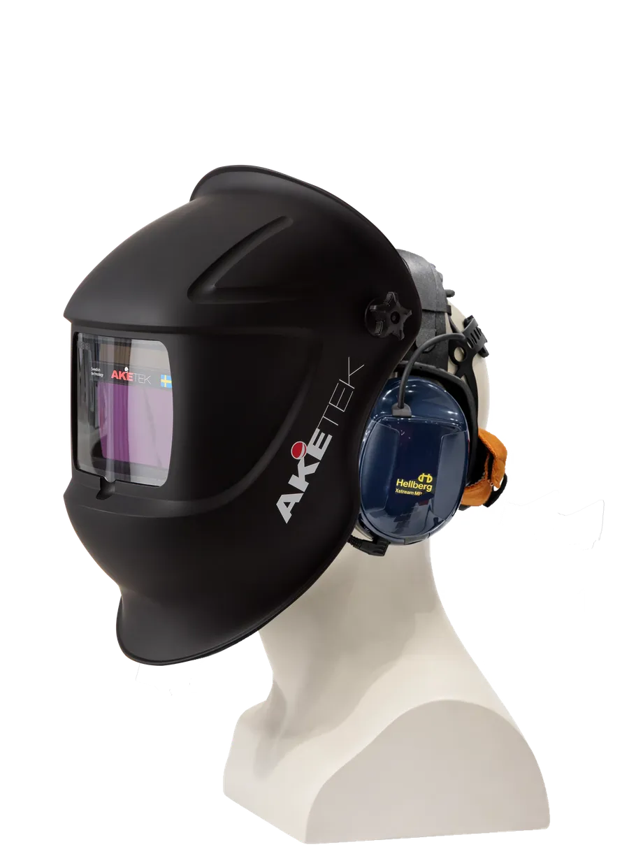 AKETEK® AUDIO welding helmet worn over earmuffs, shown on a mannequin